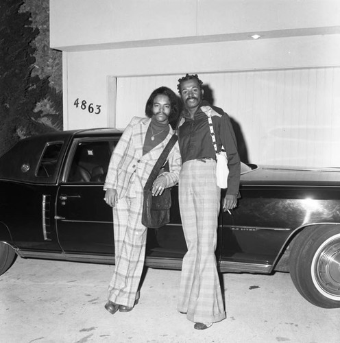 Men relaxing at an event for the Tom Bradley mayoral campaign, Los Angeles, 1973