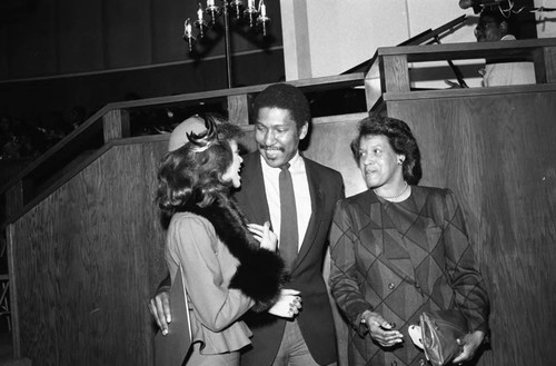 Vanessa Williams, Willis Edwards, and Myrlie Evers talking together at the NAACP 75th anniversary kick-off celebration, Los Angeles, 1984