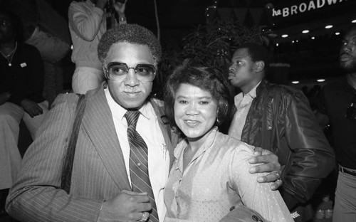 Guy Crowder posing with an unidentified woman, Los Angeles, 1982