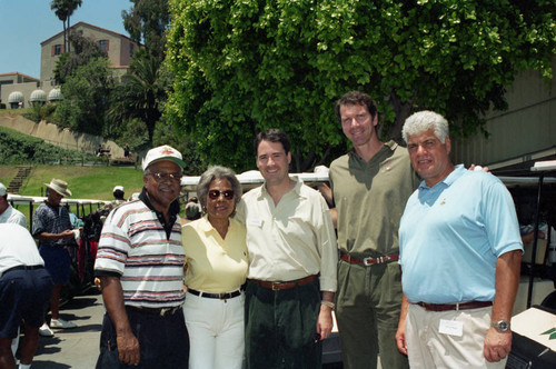Rachel Robinson and others posing together during the Jackie Robinson Foundation Golf Classic, Los Angeles. 1994