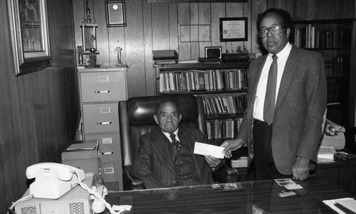 Reverend Brenson and Older Man in Office, Los Angeles, 1986