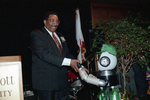 LAPD Chief Willie Williams greeting Recycle Robot, Los Angeles, 1992