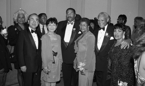 Willie L. Williams posing with others at the Los Angeles Urban League Whitney M. Young Award Dinner, Los Angeles, 1994