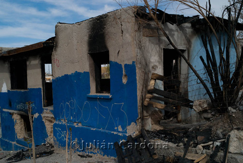 Damaged building with blue paint, Juárez, 2008