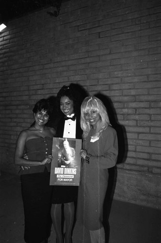 David Dinkins supporters holding a poster, Los Angeles, 1989