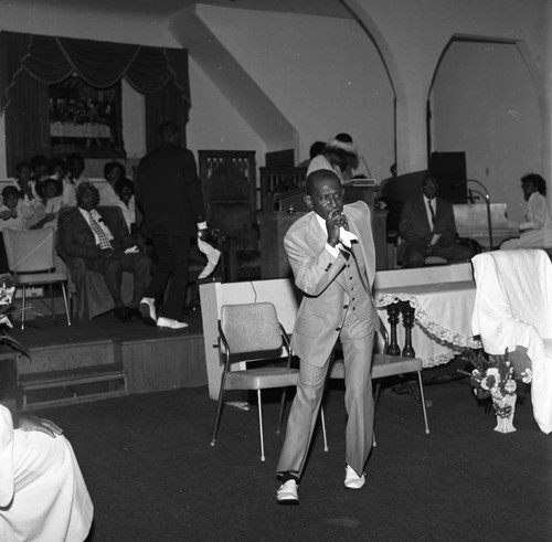 Bishop Barnes preaching in front of the pulpit, Los Angeles, 1976