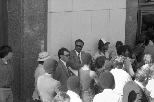 Paul Winfield waiting with others for a meeting on homelessness, Los Angeles, 1986