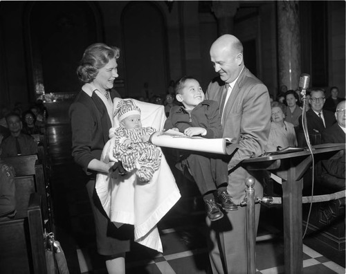 Councilman with Korean war orphans, Los Angeles, 1963