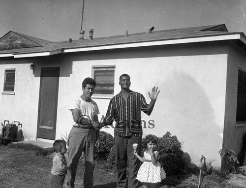 Two men and children, Los Angeles, 1961