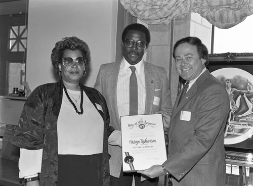 Melvyn Richardson receiving a commendation from City Hall, Los Angeles, 1983