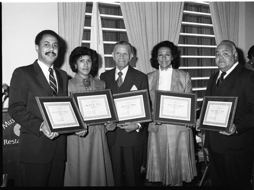 California Association of Black Lawyers members holding certificates, Los Angeles, 1983
