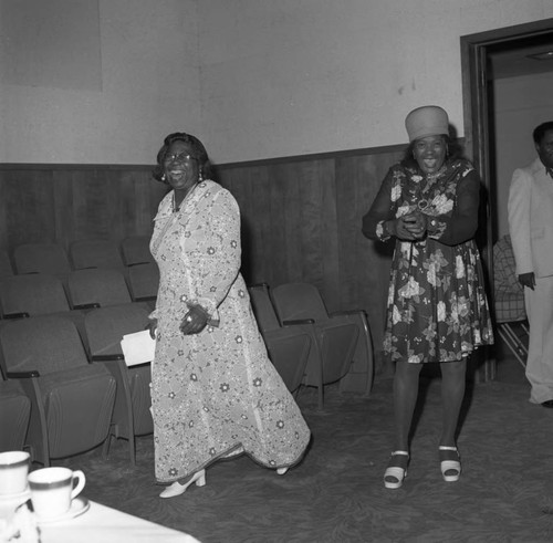 Women attending a birthday celebration for Michael Morris, Compton, ca. 1974