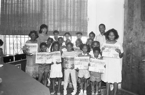 Children holding copies of the Los Angeles Sentinel, Los Angeles, 1984