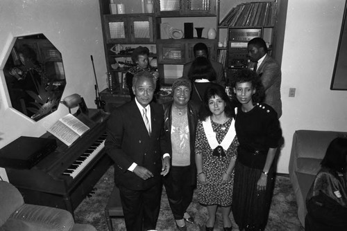 David Dinkins posing with three women, Los Angeles, 1989