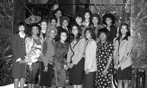 Charles R. Drew Medical Society Auxiliary luncheon attendees posing together, Los Angeles, 1989