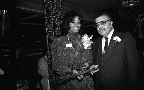 Couple posing together at a Freidman Occupational Center Luncheon, Los Angeles, 1982