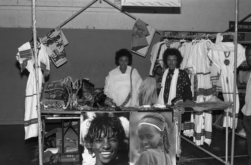 Women exhibiting items in their booth during the annual African festival, Los Angeles, 1986