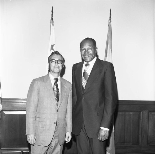 Tom Bradley posing with KGFJ's Arnold Schorr, Los Angeles, 1974