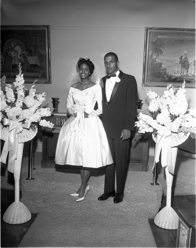 Bryant-Fair wedding couple posing together, Los Angeles, 1962