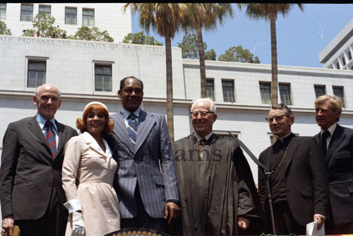 Tom Bradley standing with others during his inauguration as mayor, Los Angeles, 1973