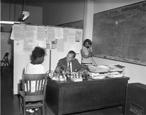 Man at desk, Los Angeles, 1965