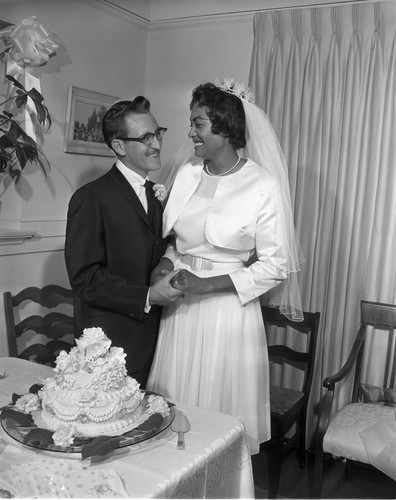 Bride and groom at wedding, Los Angeles, 1962