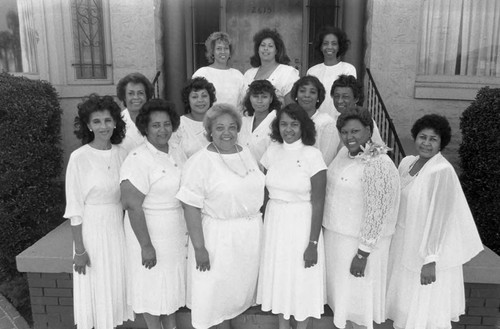 Alpha Gamma Omega Chapter members posing in front of the AKA House, Los Angeles, 1987