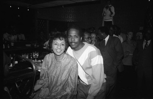 Gertrude Gipson posing with an unidentified man at the Pied Piper nightclub, Los Angeles, 1984