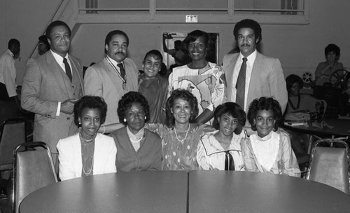 Mickey Cureton posing with others at an event in his honor, Los Angeles, ca. 1985