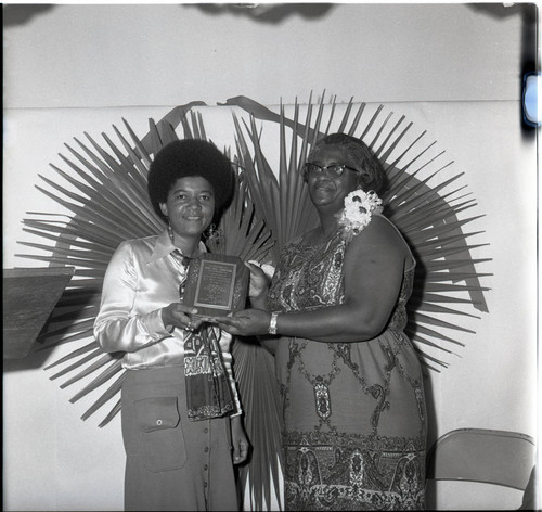 Calvary Baptist Church member presenting an award, Los Angeles, 1971