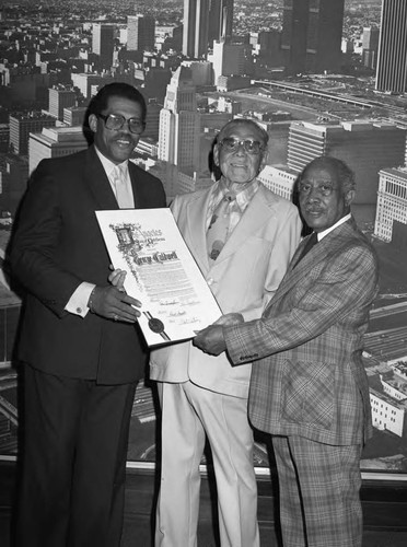 George Caldwell receiving a proclamation from David S, Cunningham, Jr. and Gilbert Lindsay, Los Angeles, 1983