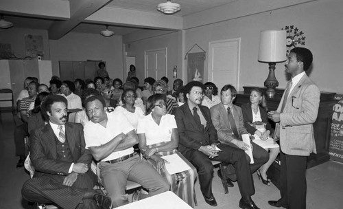 Group discussing neighborhood housing, Los Angeles, 1983