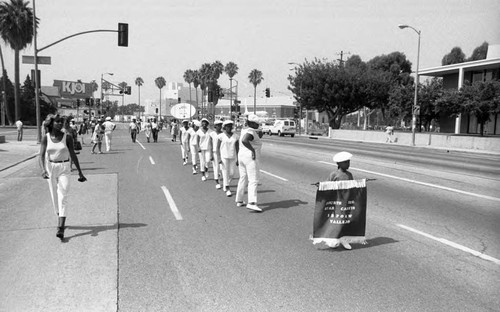 Drill team performing during the Elks Grand Temple Convention parade, Los Angeles, 1986