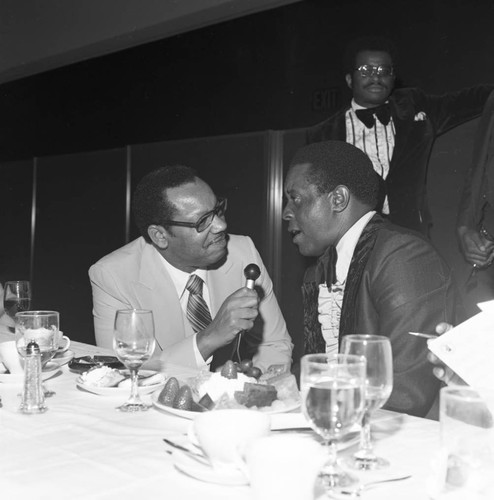 Brad Pye Jr. interviewing golfer Lee Elder, Los Angeles, 1977