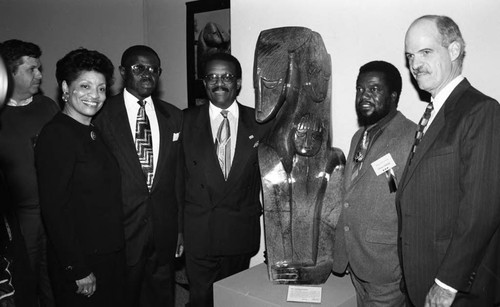 Johnnie Cochran Jr., posing with others at the "Spirits in Stone" exhibit, Los Angeles, 1995 Los Angeles, 1995