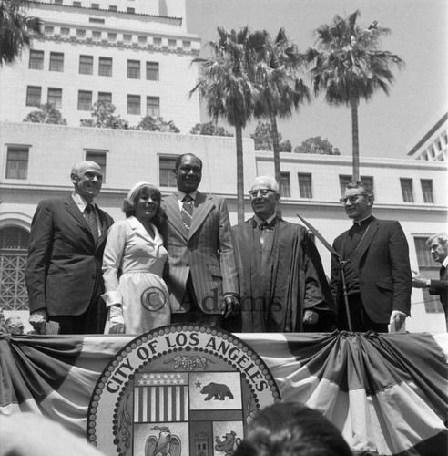 Tom Bradley standing with others during his inauguration as mayor, Los Angeles, 1973