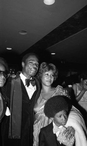 Aretha Franklin posing with Kecalf Cunningham and Glynn Turman, Los Angeles, 1978