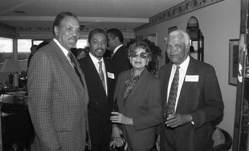 Guests posing together during an event hosting Judge Reginald A. Dunn, Los Angeles, 1996