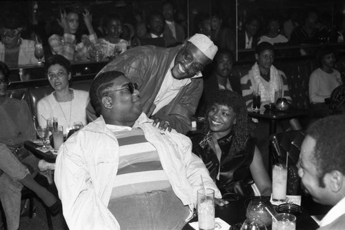 Billy Paul speaking with Fred "Rerun" Berry at the Pied Piper nightclub, Los Angeles, 1985