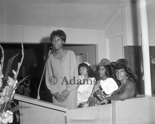 Woman at Podium, Los Angeles, 1964