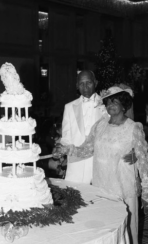 Mr. and Mrs. Willie Bryant posing at their 50th wedding anniversary celebration, Los Angeles, 1985