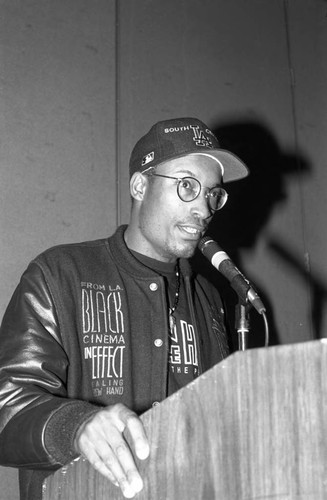 John Singletons speaking at a Black Women's Forum event, Los Angeles, 1991