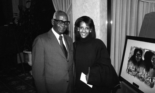 Couple posing together at a NAACP Legal Defense Fund awards dinner, Los Angeles, 1984