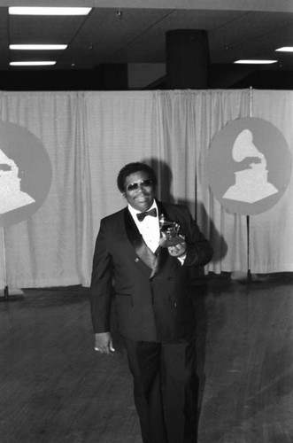 B. B. King posing with his Grammy at the 26th Annual Grammy Awards, Los Angeles, 1984