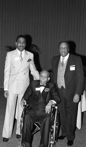 Dr. Tandy Washington Coggs Sr. posing with family on this 100th birthday, Los Angeles, 1987