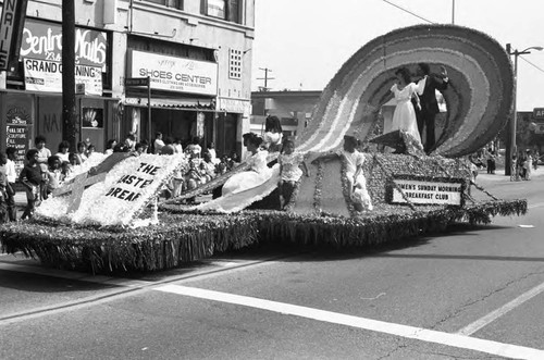 Women's Sunday Morning Breakfast Club float moving along in the South Central Easter Parade, Los Angeles, 1986