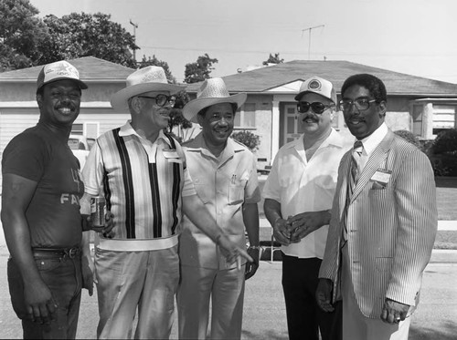 Curtis Tucker, Edward Vincent, and 4th Ave. Block Club members posing together, Los Angeles, 1983