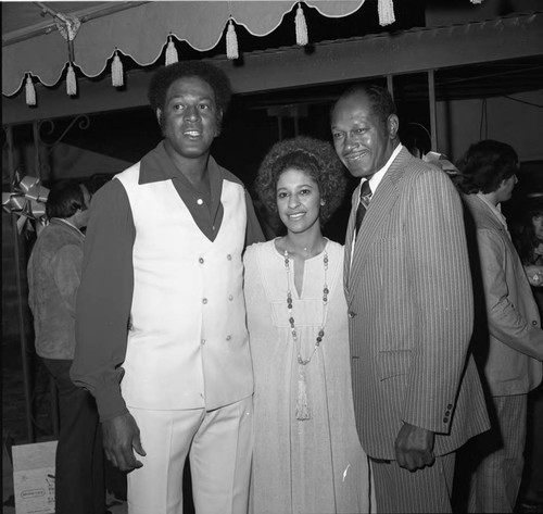 Tom Bradley posing with Elgin Baylor at an event for his mayoral campaign, Los Angeles, 1973