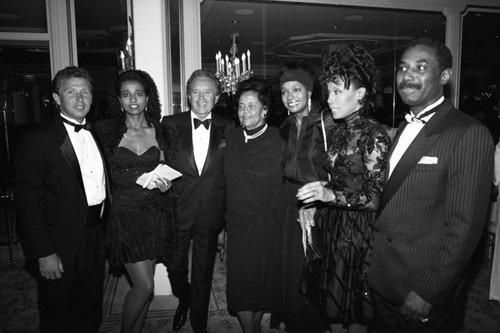 Diahann Carroll posing with family at the Black Emmy nominees dinner, Los Angeles, 1989