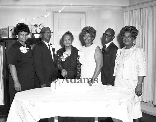 Mrs. Fannie Jefferson cuts cake, Los Angeles, 1970